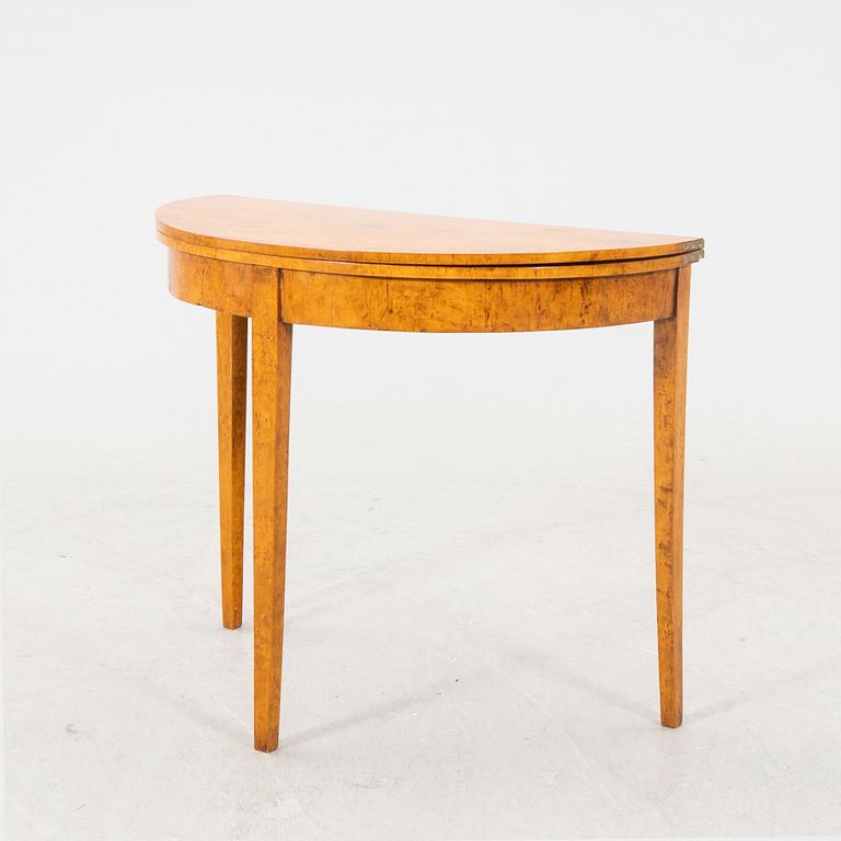 A birch folding table later part of the 19th century.