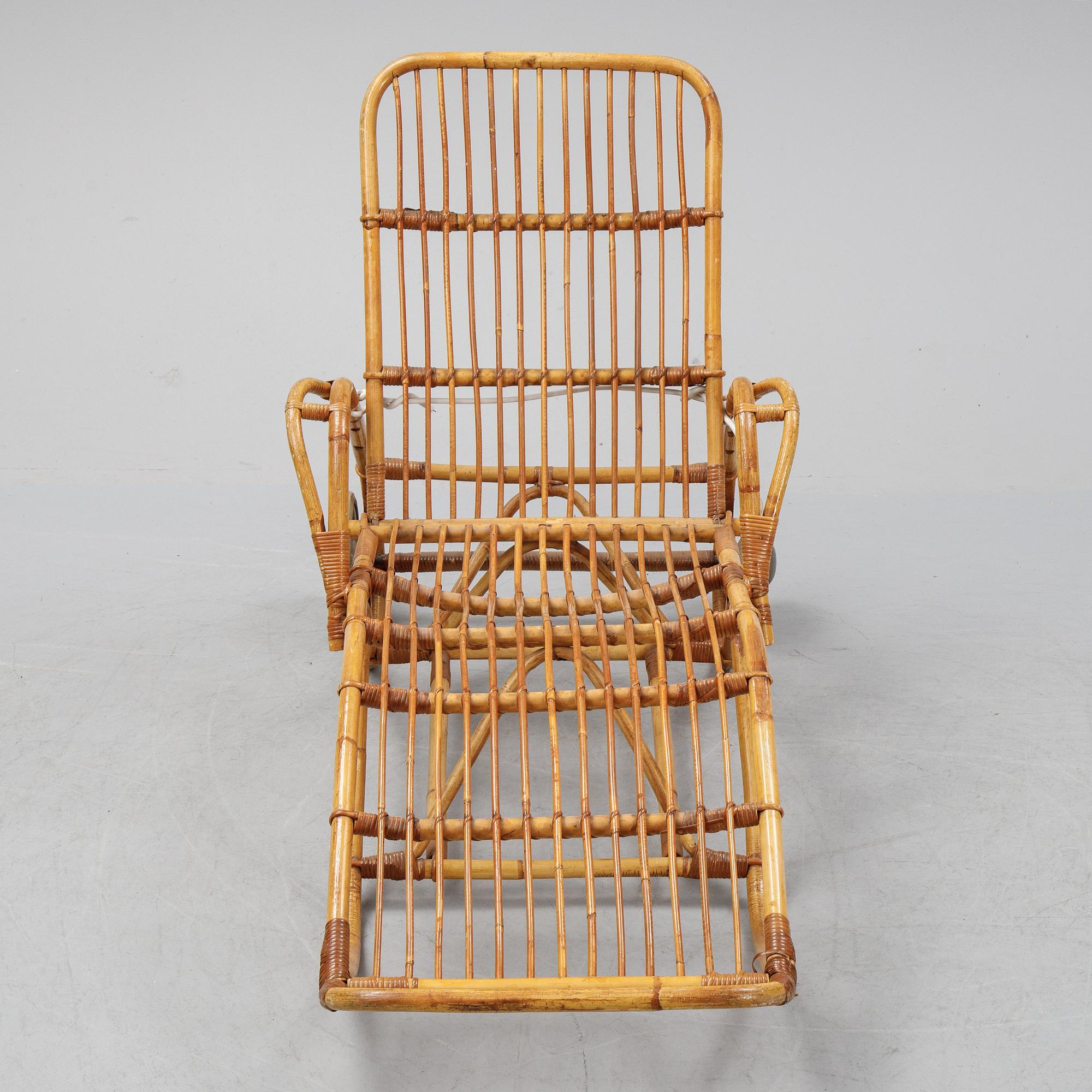 A rattan lounge chair.