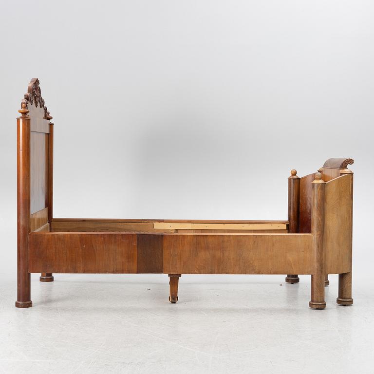 A late Empire bed, mid-19th century.