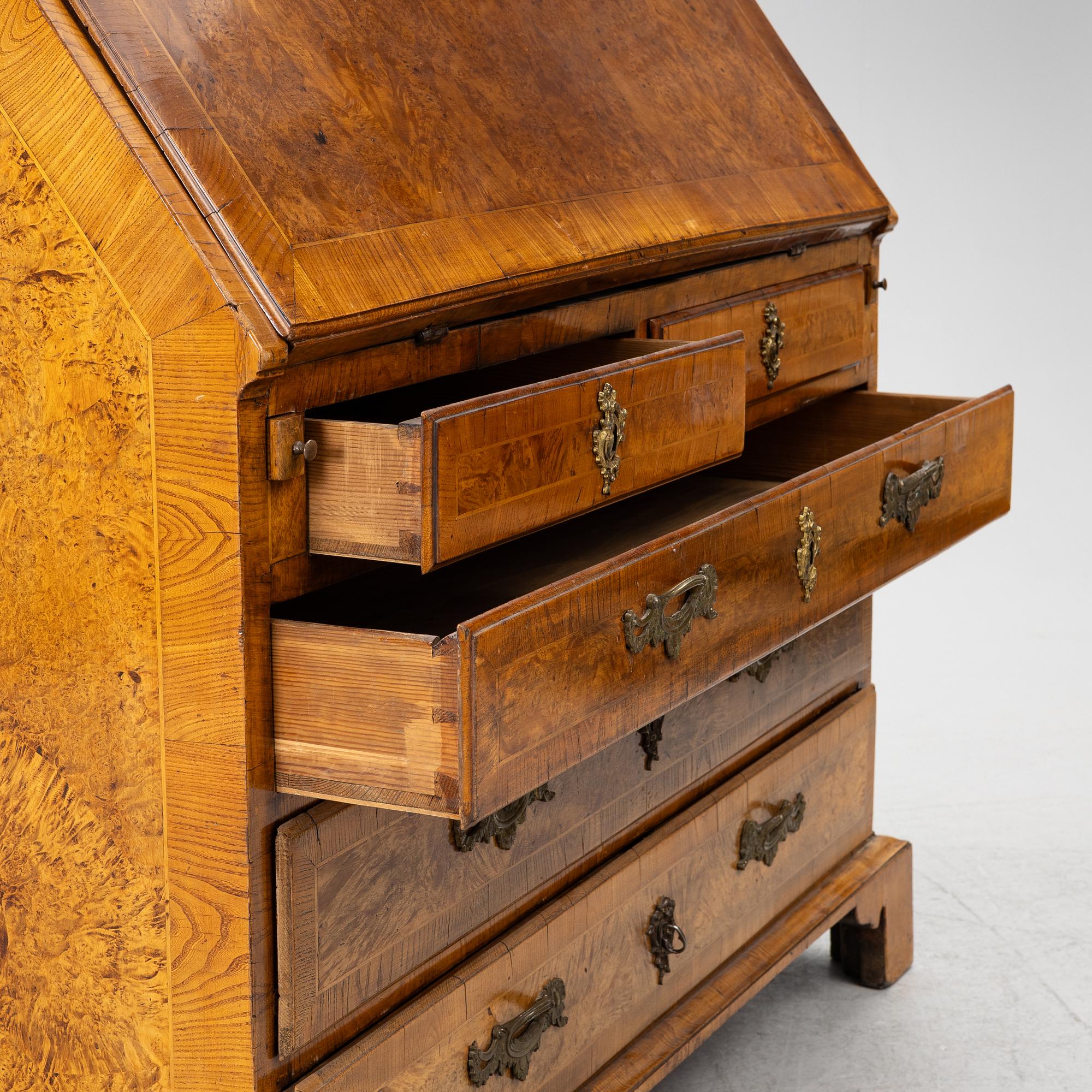 A Swedish rococo burr-alder veneered cabinet, later part 18th century.