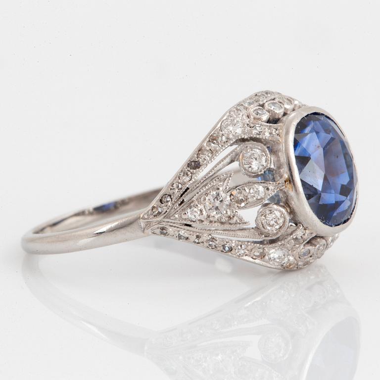 An A Tillander platinum ring set with a faceted sapphire ca 4.25 cts.