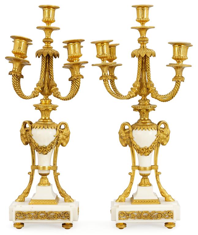 A pair of Napoleon III five-light candelabra.