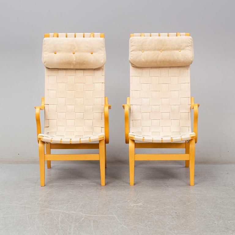 BRUNO MATHSSON, armchairs (2), "Eva hög", DUX, late 20th or early 21th C.