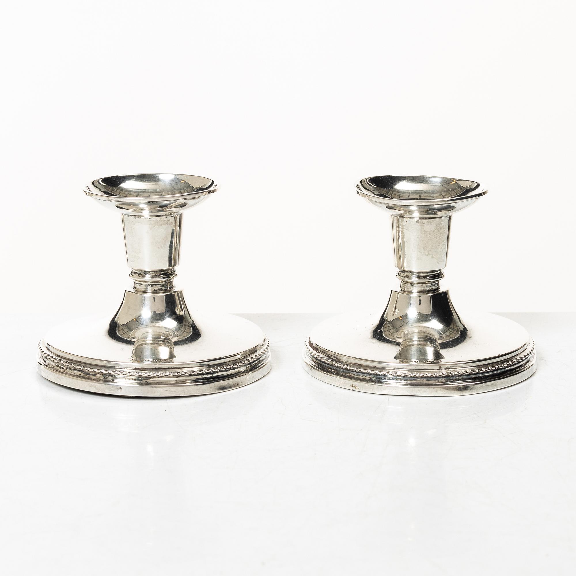 A pair of silver candlesticks, MGAB, Uppsala, 1966.