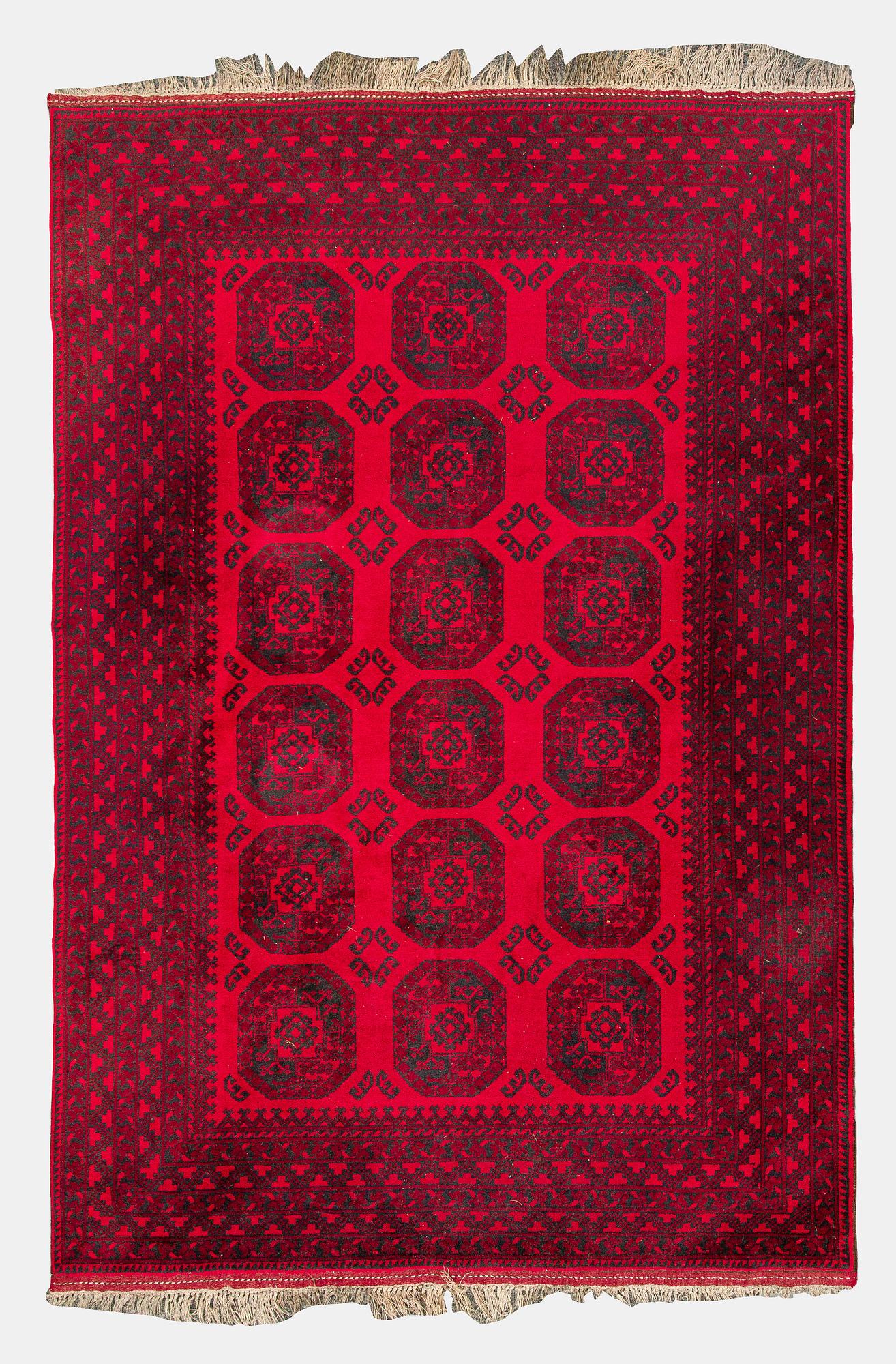 Two Afghan carpets. Ca. 326 x 217 and 88 x 63 cm.