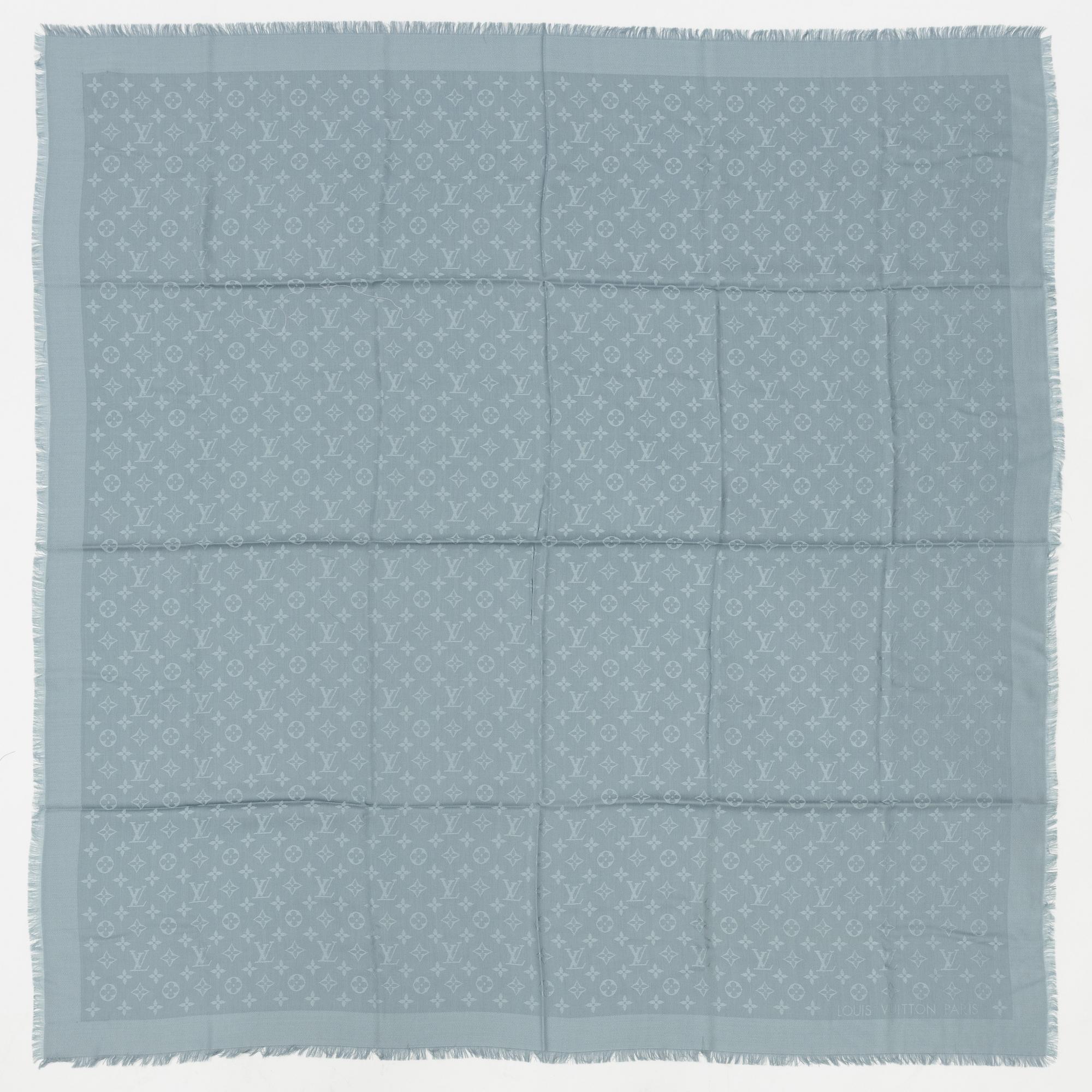 Louis Vuitton, a monogram silk and wool mix shawl.
