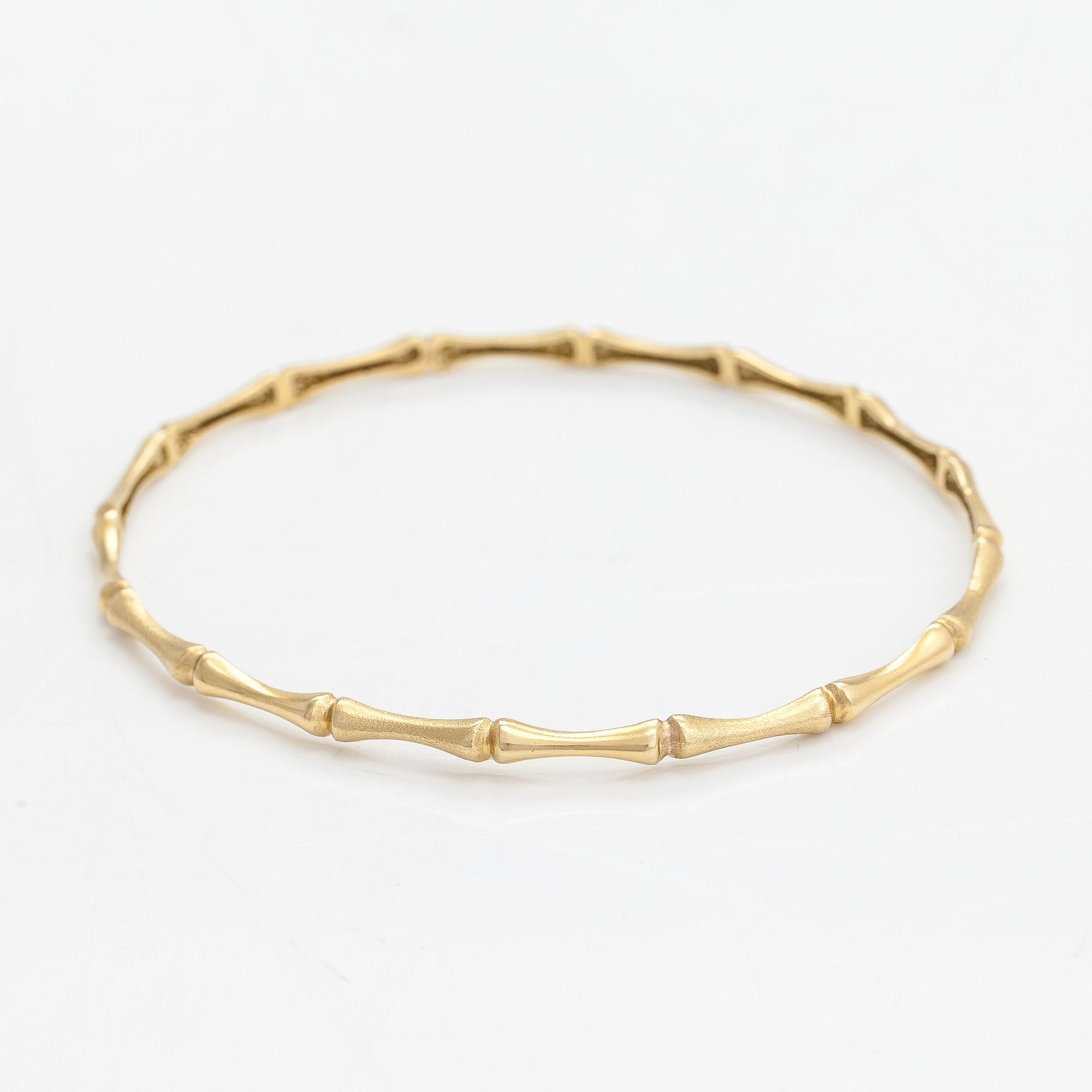 Rannekoru, 18K kultaa.