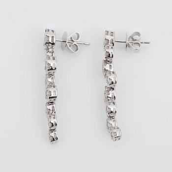 A pair of diamond earrings, 3.15 cts in total.