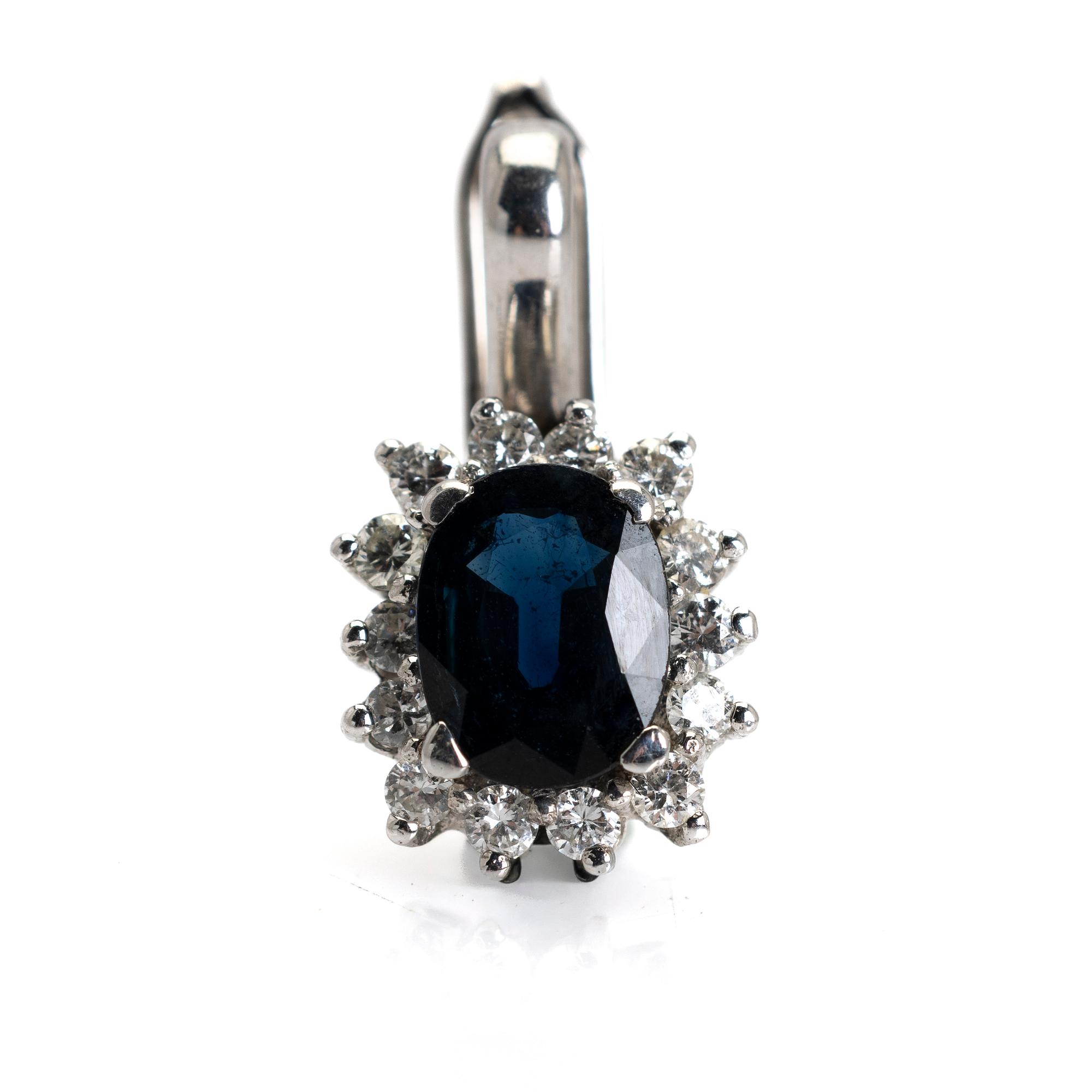 Pendant, 18K white gold with sapphire and diamonds.