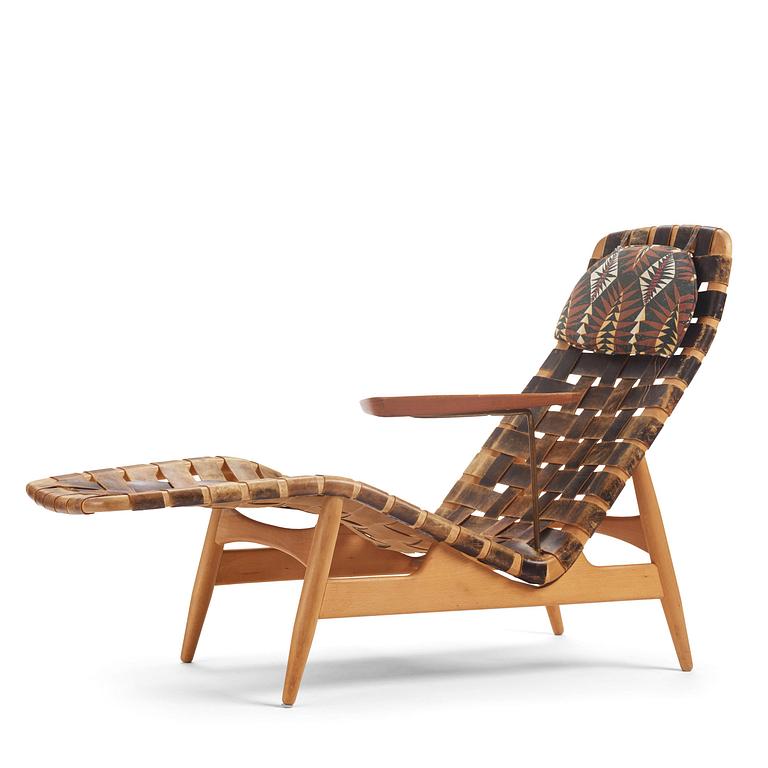 Arne Vodder, a woven leather lounge chair with attached side table, Bovirke, Denmark, 1950s.