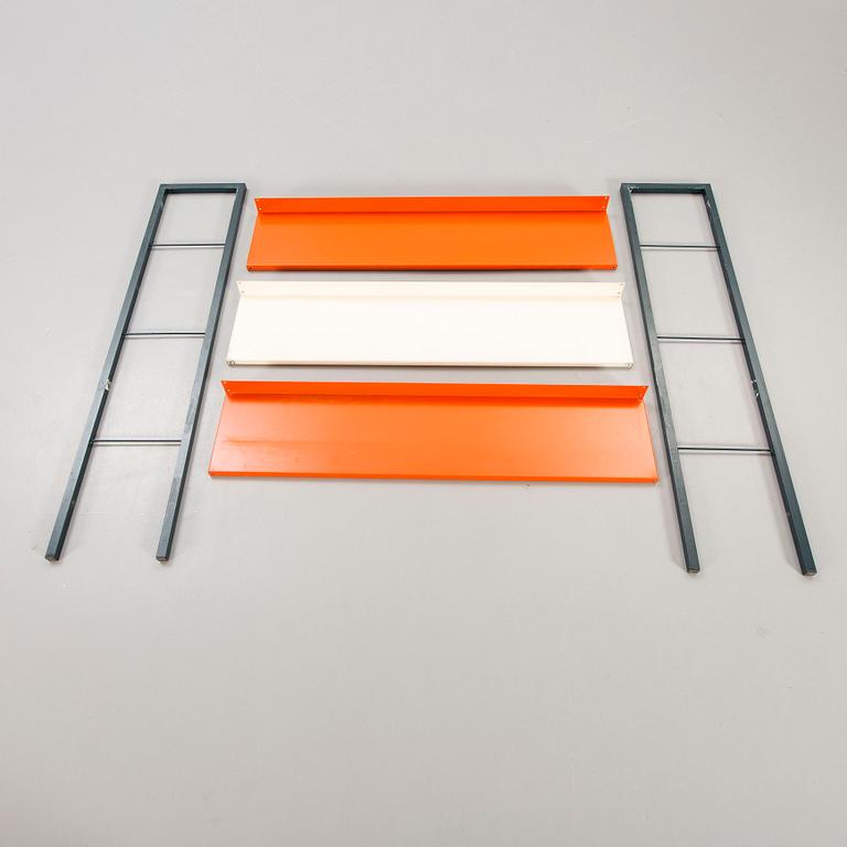A 1950s  Adriaan Dekker lacquered metal book shelf for Tomato Holland.