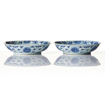 A pair of blue and white 'lotus' dishes, Qing dynasty, Tongzhi mark and of the period period (1862-74).