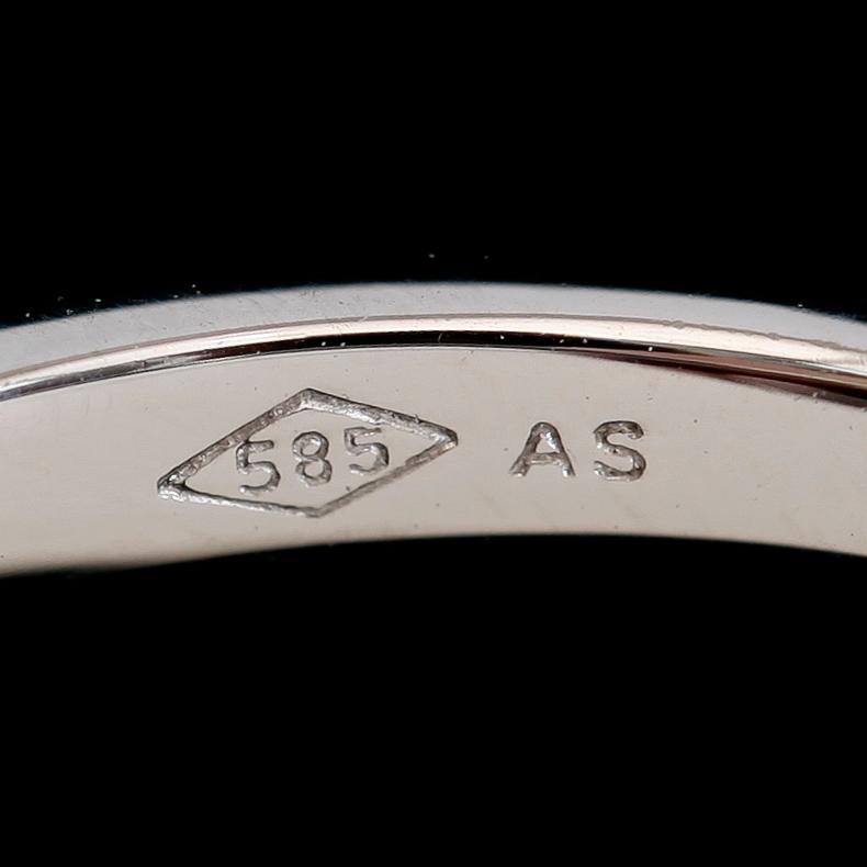 RING, 14K vitguld, briljantslipade diamanter. Vikt ca 3 g.