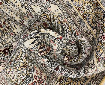 An Oriental silk rug, approx. 122 x 79 cm.