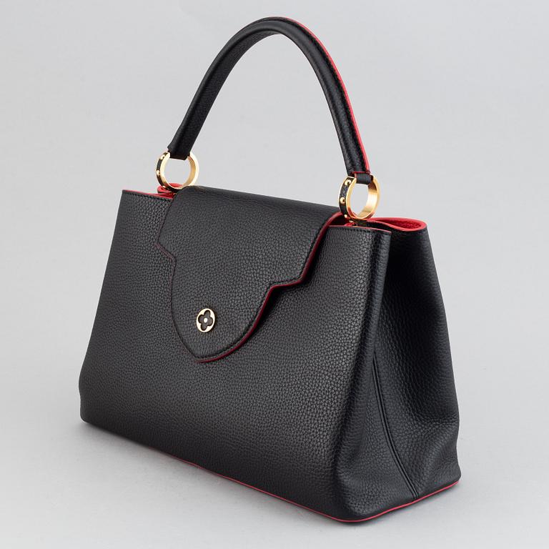 Louis Vuitton, a 'Capucines MM' Taurillon leather, 2015.