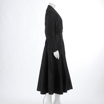 A black silkcoat from Nordisk Kompaniet 1916.