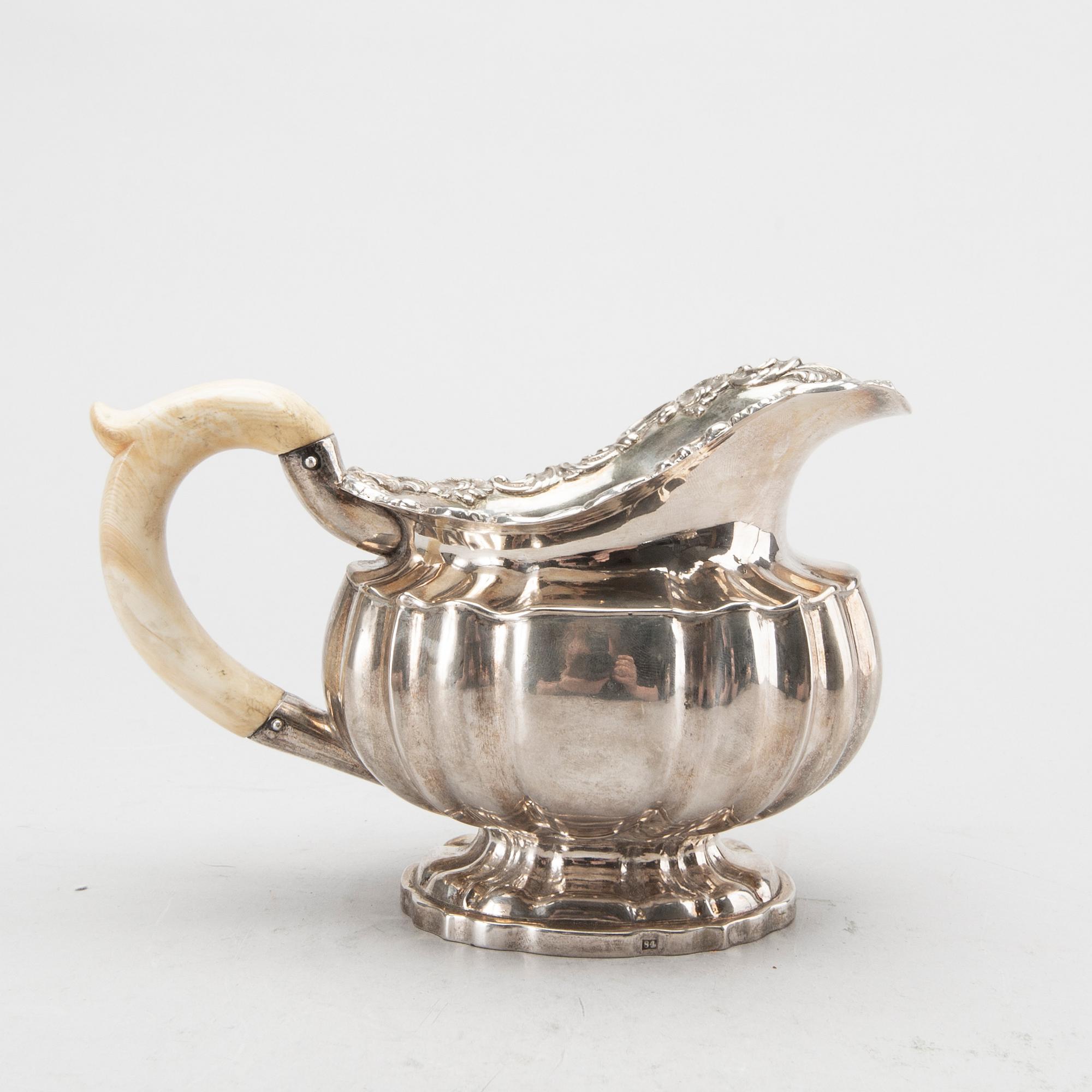 A Russian 3 pcs sivler teaservice assayermakr of N L Dubrovin Moscow 1840, totla weight ca 1450 gr.
