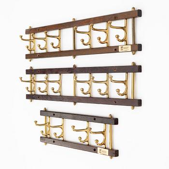 A set of three 'Dekorativ' coat hangers, Skoglunds metallgjuteri, Anderstorp, 1950's/60's.