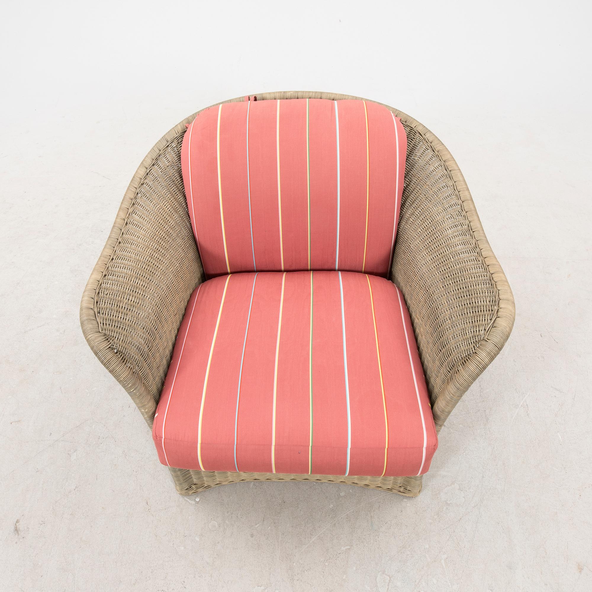 A Bonacina special edition rattan armchair 21st  century.