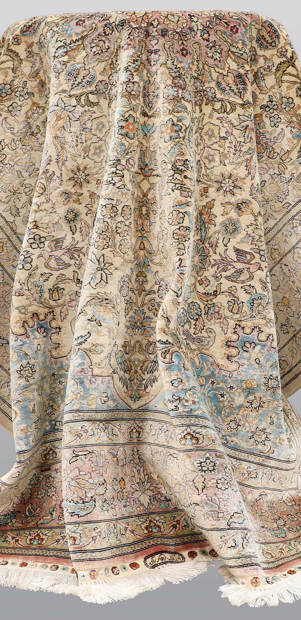 A rug, Figural Oriental silk,  signed, ca 175 x 125 cm.