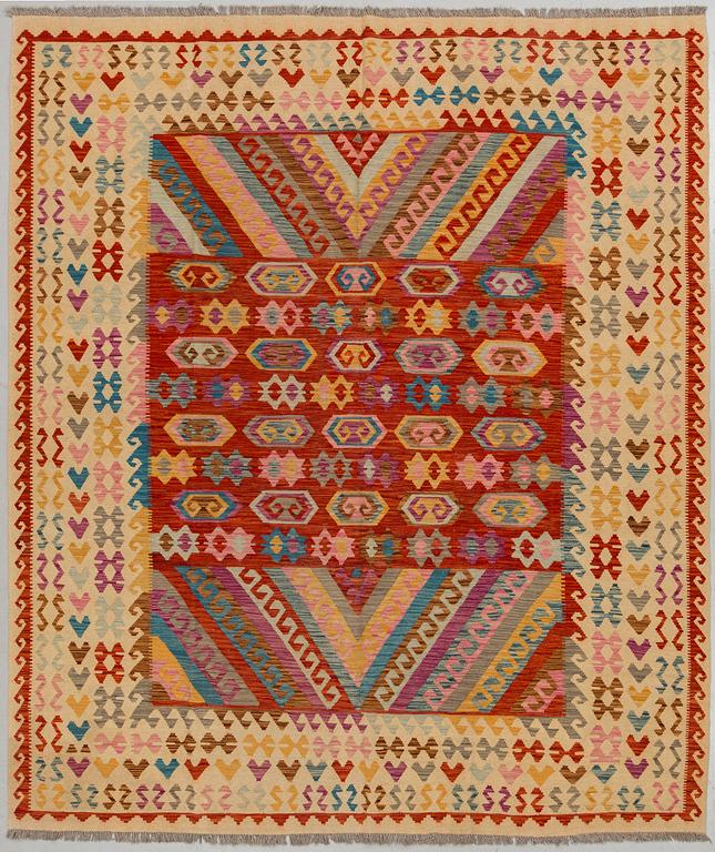 A CARPET, kilim, around 299 x 253 cm.