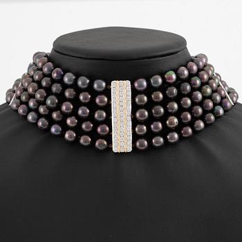 Necklace, five-row with cultured black pearls, 18K gold and white gold with brilliant-cut diamonds.