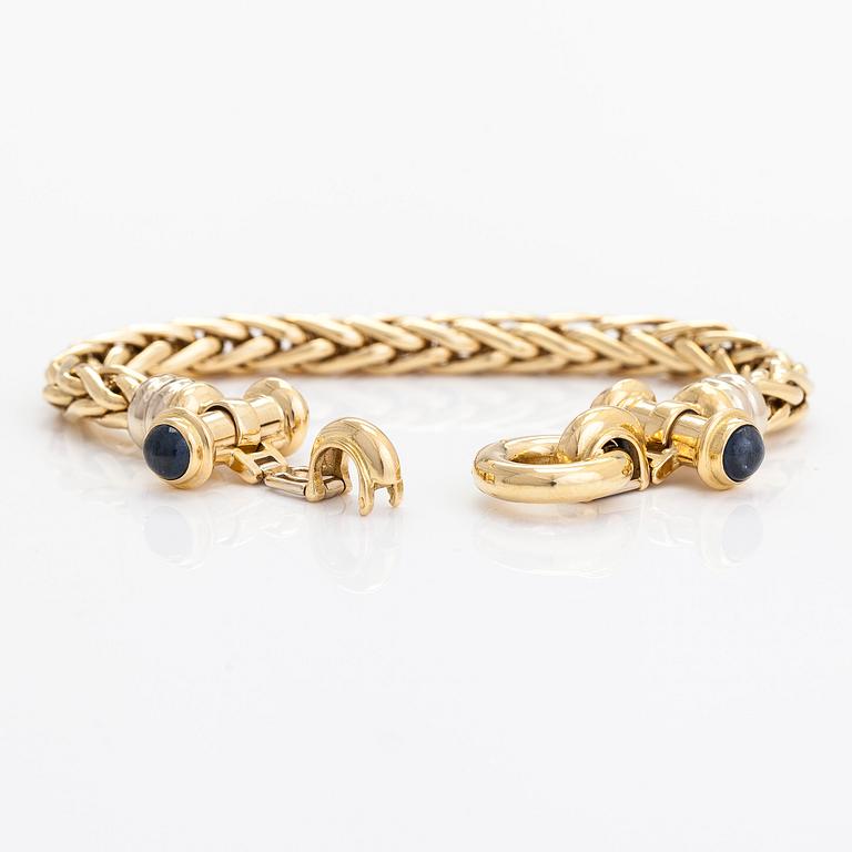 An 18K gold bracelet, with cabochon-cut sapphires, France.