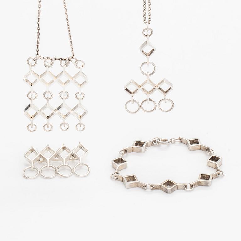 Jorma Laine, a set of two silver pendants, a bracelet and a brooch. Kultateollisuus Oy, Turku 1965-1972.