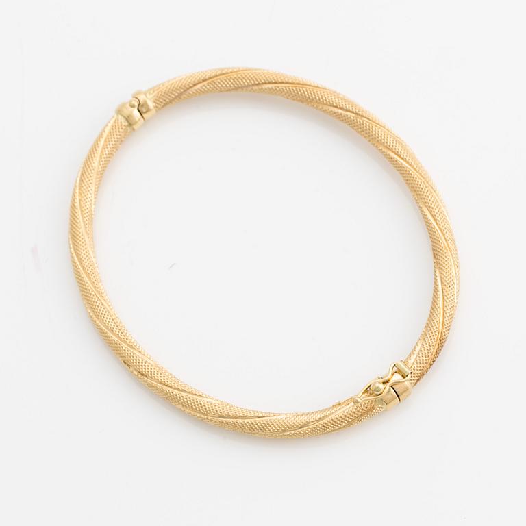 Bangle, 18K gold, twisted decoration, Uno A Erre, Italy.