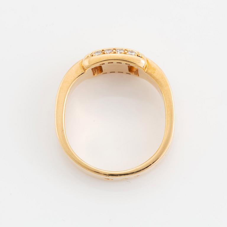 Hermès 18K gold ring set with round and brilliant-cut diamonds.