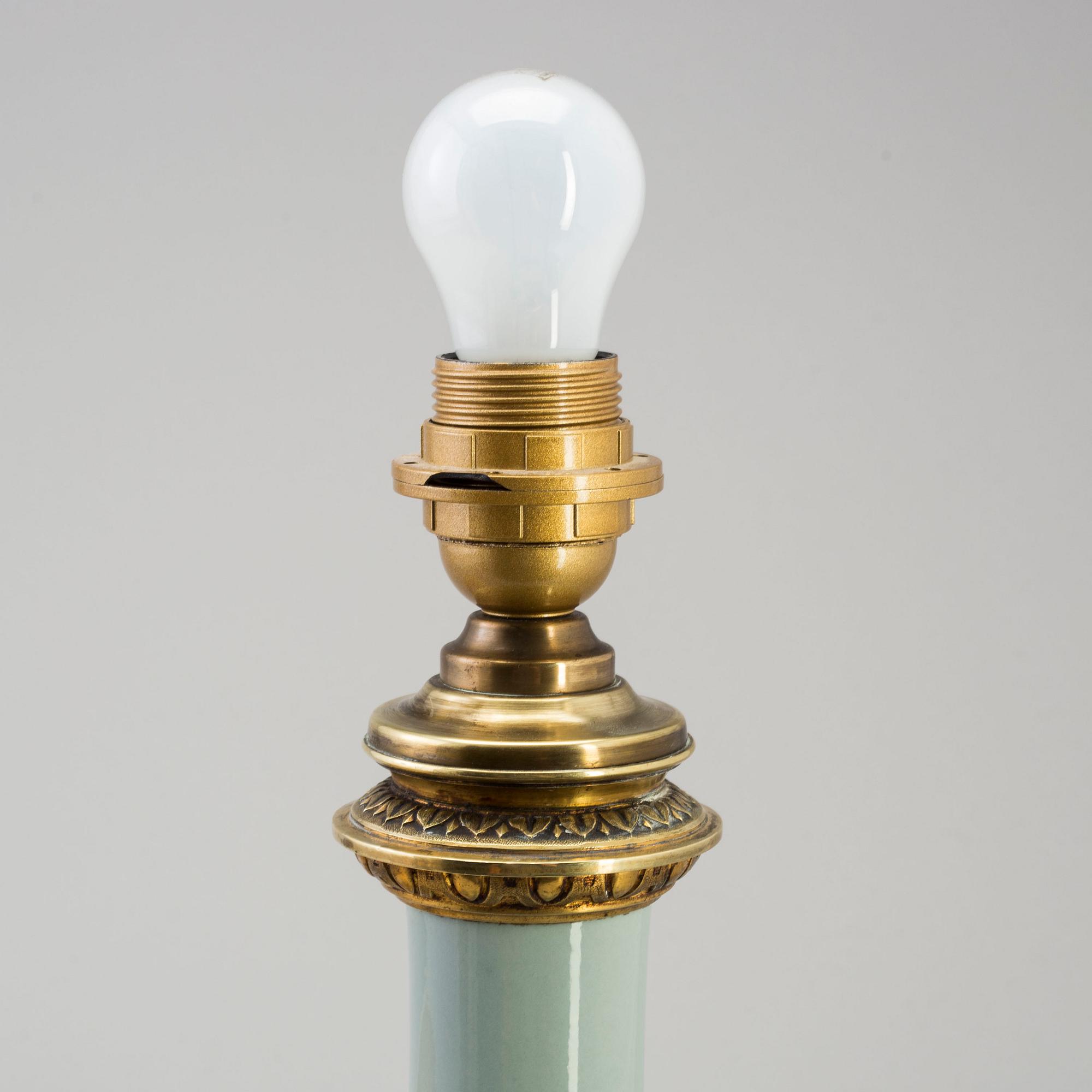 A 20th century celadon Chinese porcelain vase/table lamp, with  european gilt-bronze mount, 19th century.