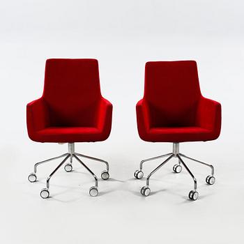 A pair of 21th century arm chairs by Roger Person, model "Happy", Swedese.