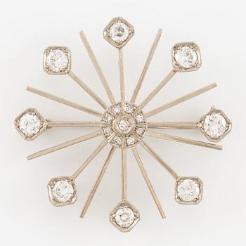Brooch 18K white gold set with round brilliant-cut and octagonal-cut diamonds.