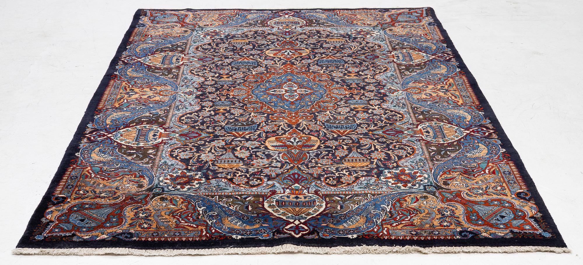 A Kashmar carpet, c. 295 x 198 cm.