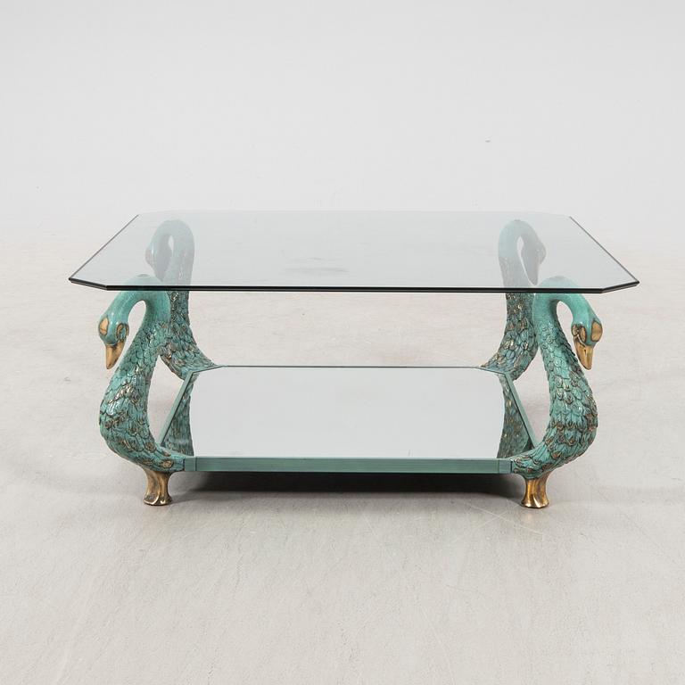 A late 20th century glass and metal coffee table.