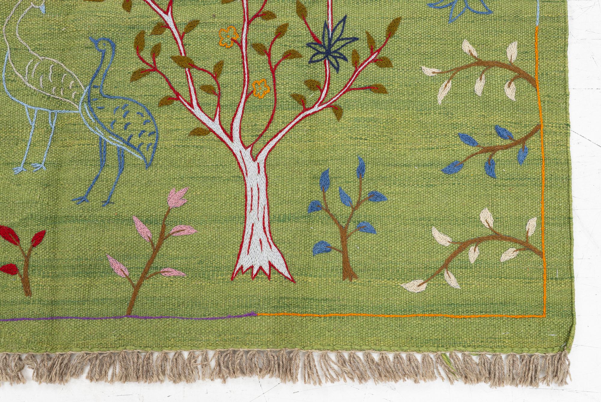 A hand-embroidered Kilim rug, c. 200 x 150 cm.
