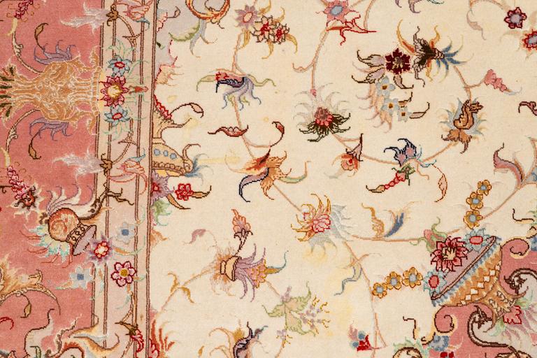Rug, Tabriz, approx. 305 x 203 cm.