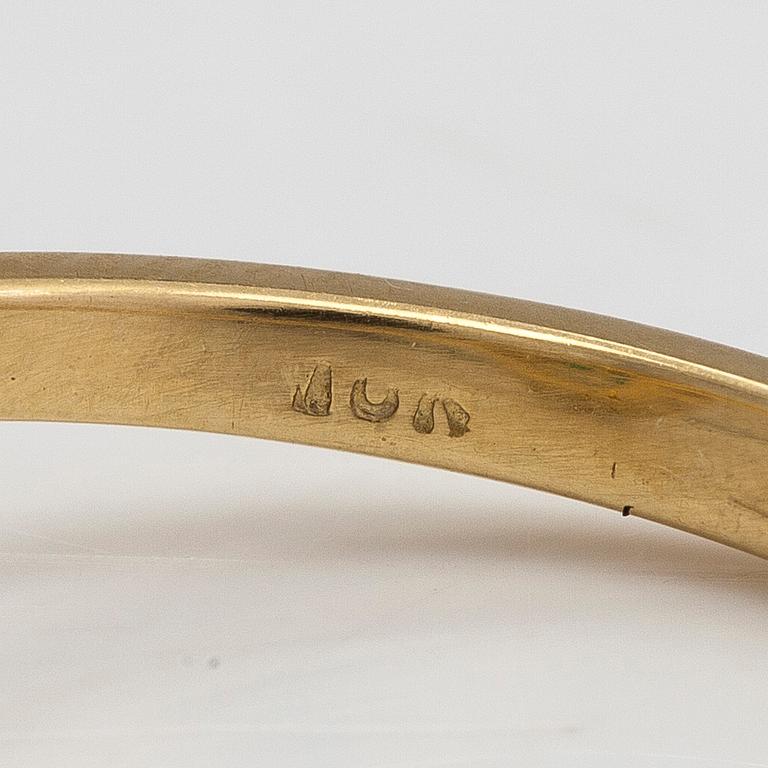 Sormus, 18K kultaa, smaragdi sekä briljanttihiottuja timantteja yht n 0.18 ct.