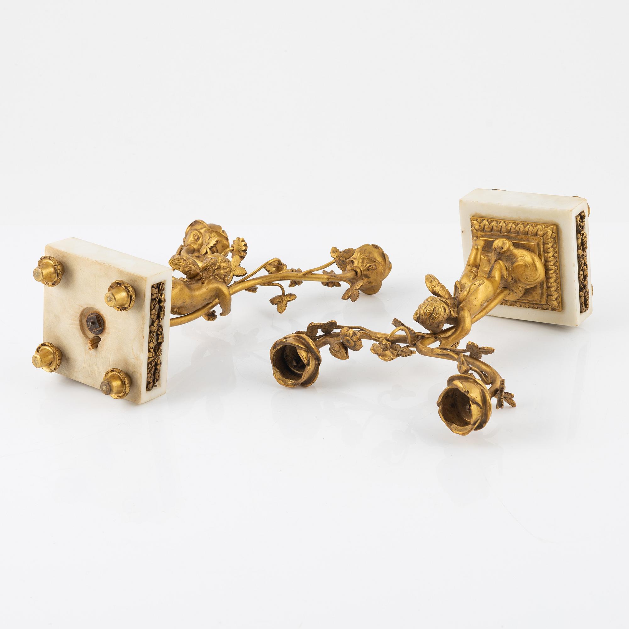 A pair of Louis XVI style candelabras, 20th century.