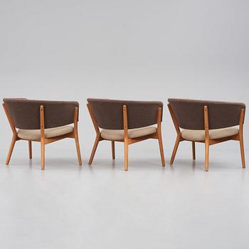 Nanna Ditzel, a set of three teak lounge chairs, Søren Willadsen, Denmark, 1950-60s.