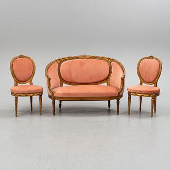 A sofa and a pair of chairs, Louis XVI-style, late 19th century.