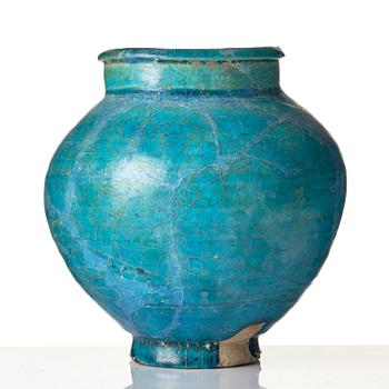 A turquoise Keshan pottery vase, central Persia, 13th century.