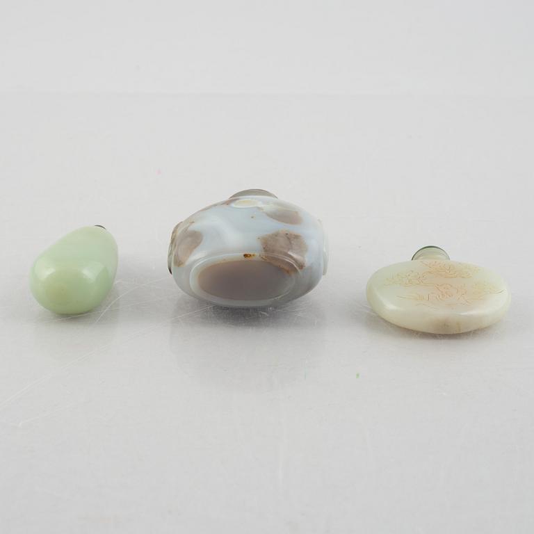 A group of three Chinese stone snuffbottles, 20th century.