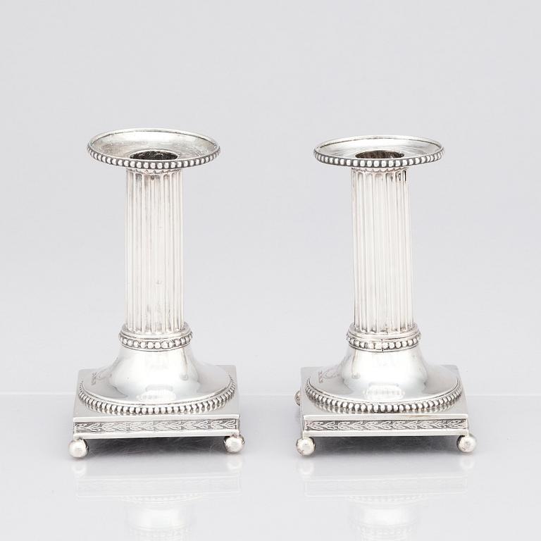 A pair of Swedish 18th century silver candlesticks, mark of Johan Ekholm, Stockholm 1799.