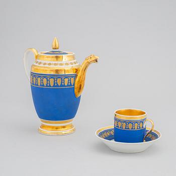 A 13 piece Empire porcelain coffee service, marked T.G.C. Paris, France, first half of the 19th century.