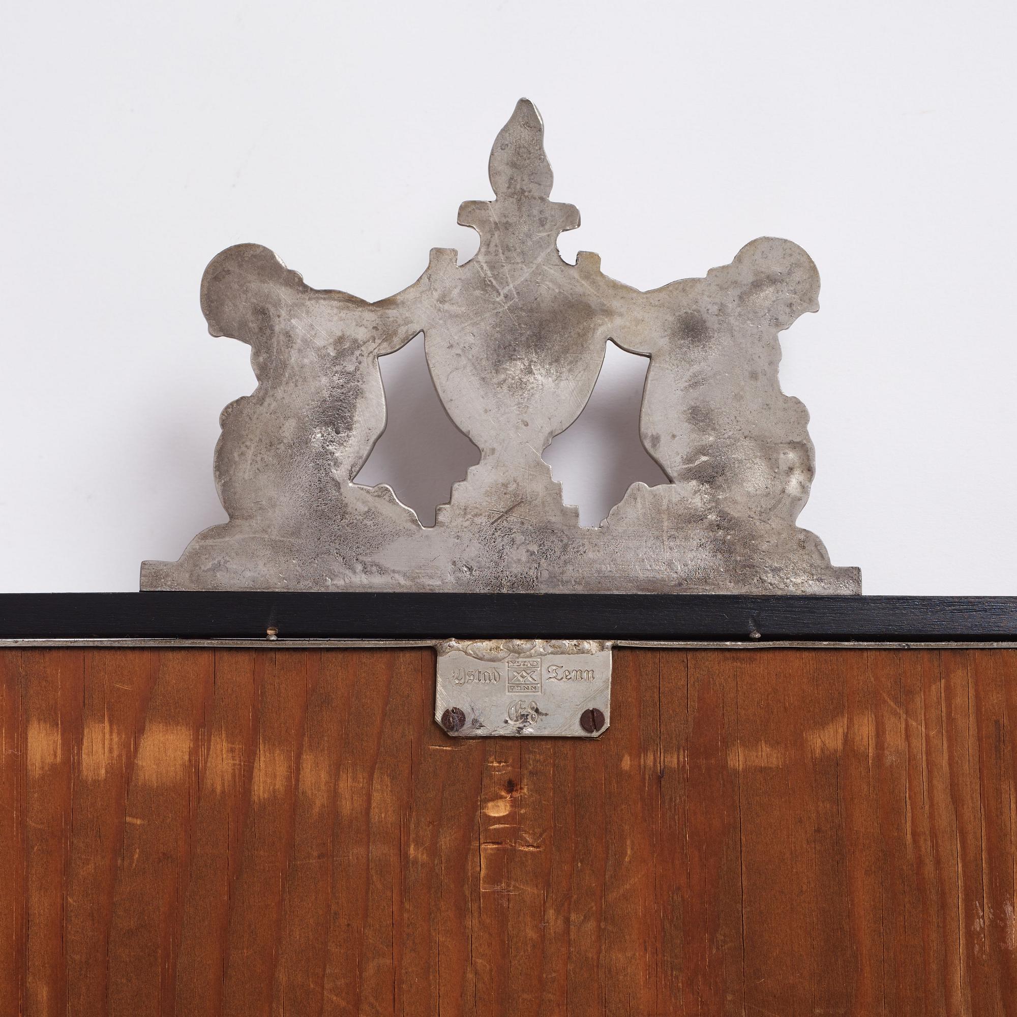 Oscar Antonsson, a Swedish Grace pewter framed mirror, Ystad Tenn, Sweden 1932.