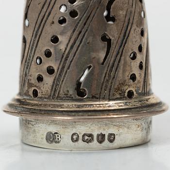 Two silver casters and cream jug, England.
