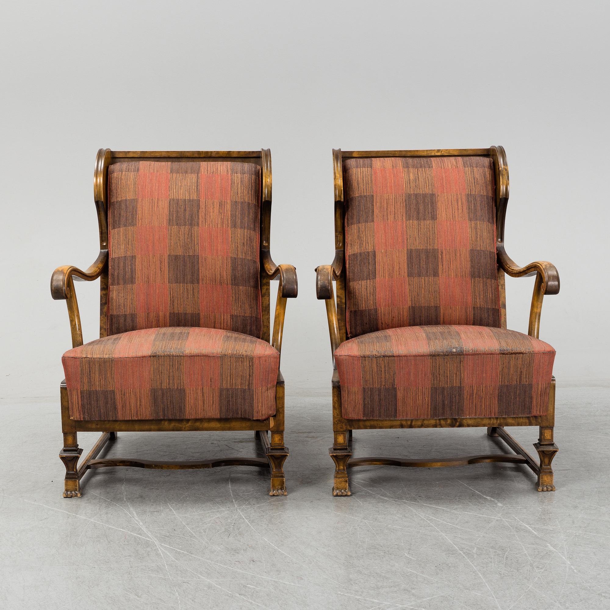 A pair of 1920s easy chairs.