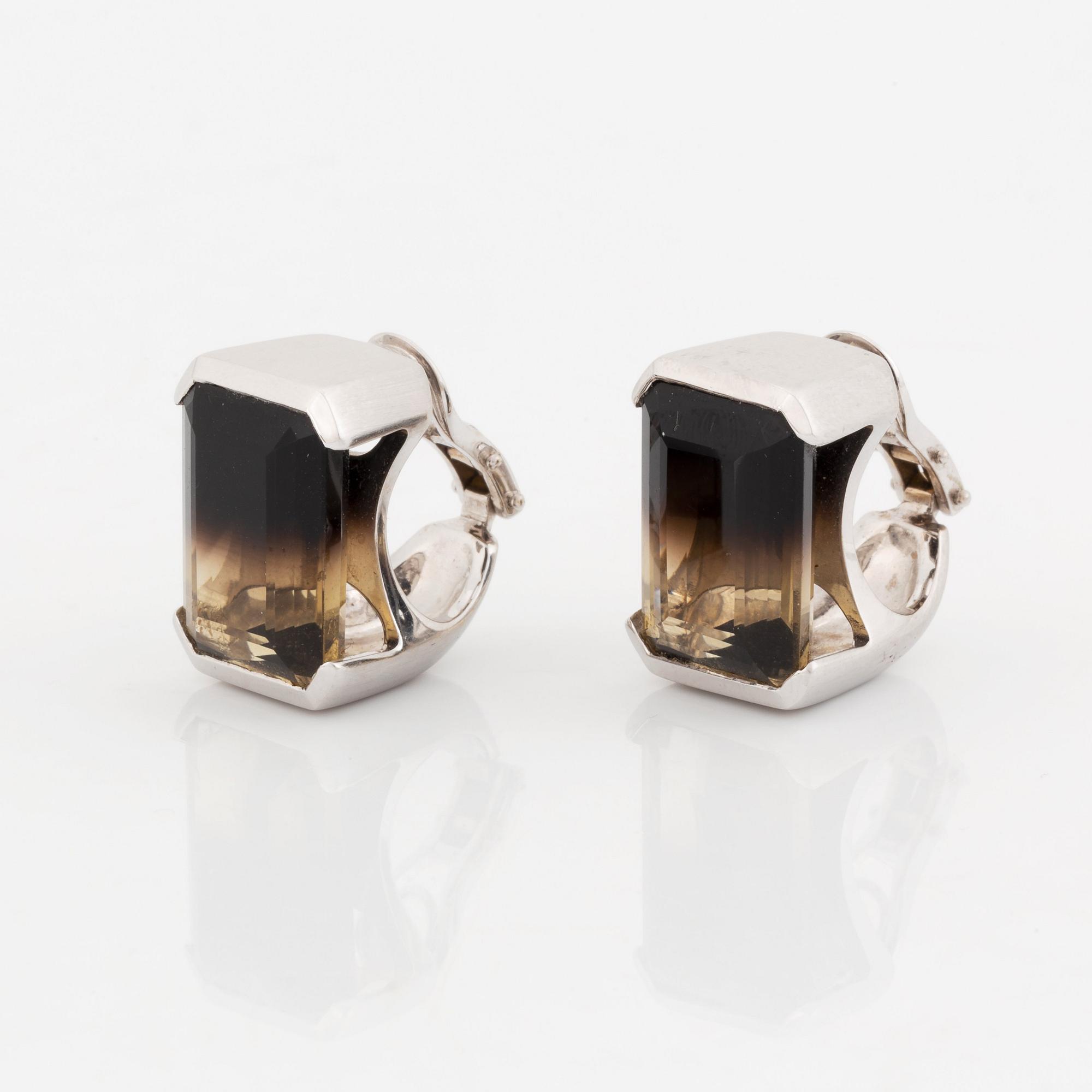 A pair of Tina Karlsson earrings in 18K white gold set with facted quartz.