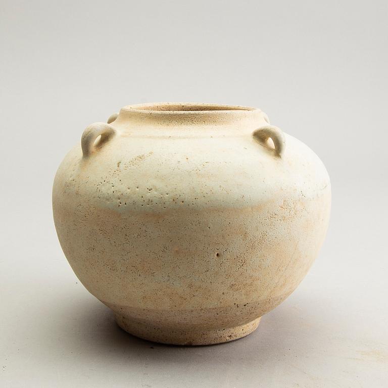 A white glazed South East Asian jar, presumably Sawankhalok, 15th Century.